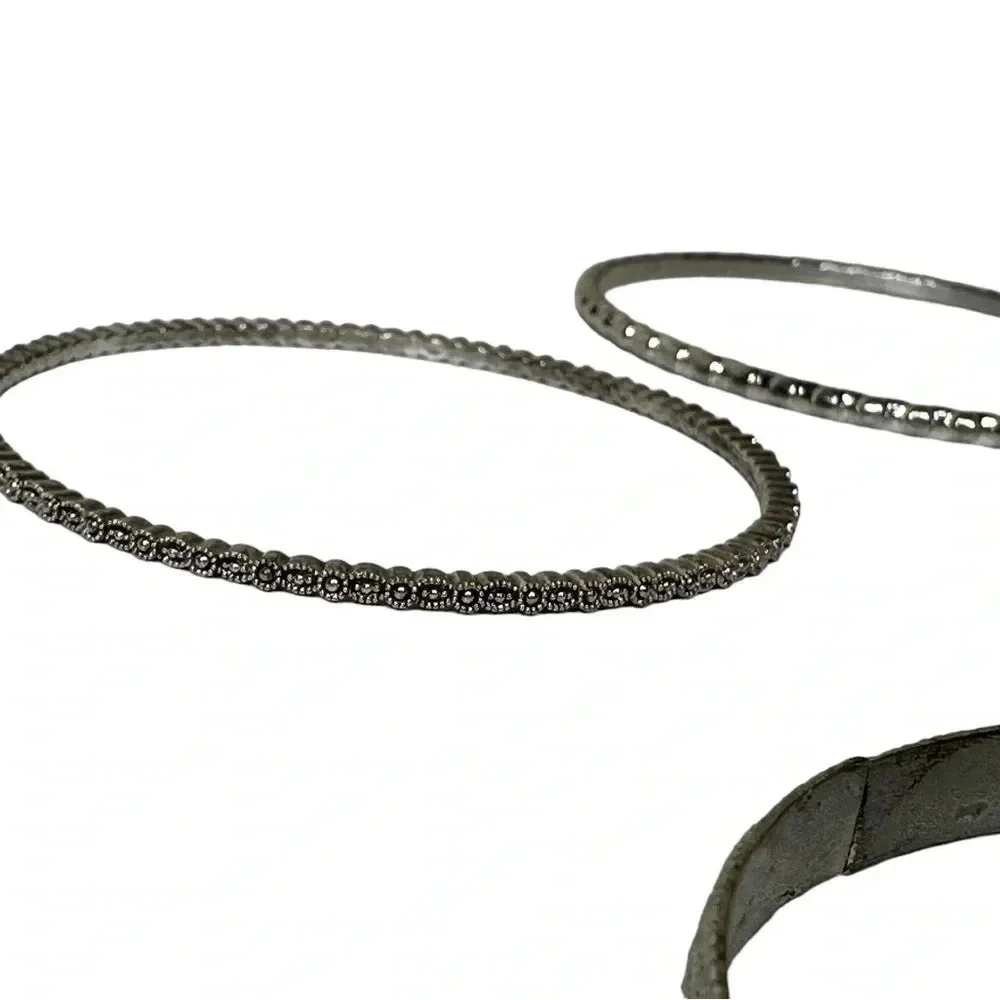 Set of 4 silver bangle bracelets